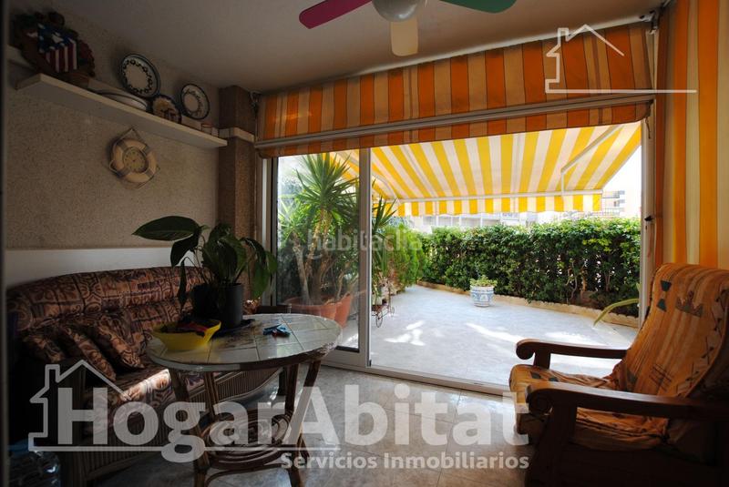 Foto 8e28b5b0-cc84-4978-8aa4-24338d634d01. Piso segunda línea de playa! exterior con piscina, garaje y terraza en Daimús