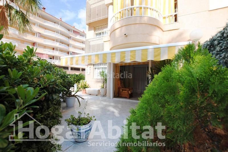 Foto 93e50b8a-0bc7-4ad0-8993-b8666287240a. Piso segunda línea de playa! exterior con piscina, garaje y terraza en Daimús