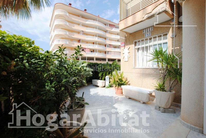 Foto a909e1dd-cb15-495e-8554-c76f17f05928. Piso segunda línea de playa! exterior con piscina, garaje y terraza en Daimús