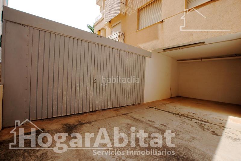 Foto d870314d-bc12-41e2-b8d0-3562a9131894. Piso segunda línea de playa! exterior con piscina, garaje y terraza en Daimús