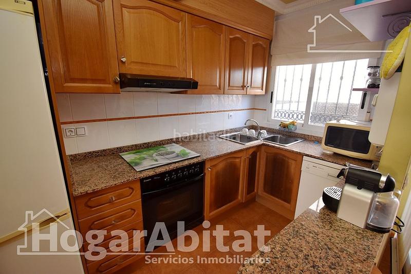 Foto 254ba057-8b9c-465f-add2-266806dfea81. Casa adossada amb aparcament a La Torre-Playa de Chilches Moncofa