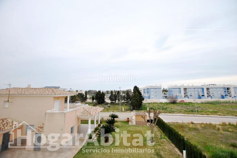 Foto 0a162c0d-82be-4c52-a3b2-e0f922460d00. Piso acogedor y todo exterior en residencial con piscina y terraza cerca del mar en Oliva