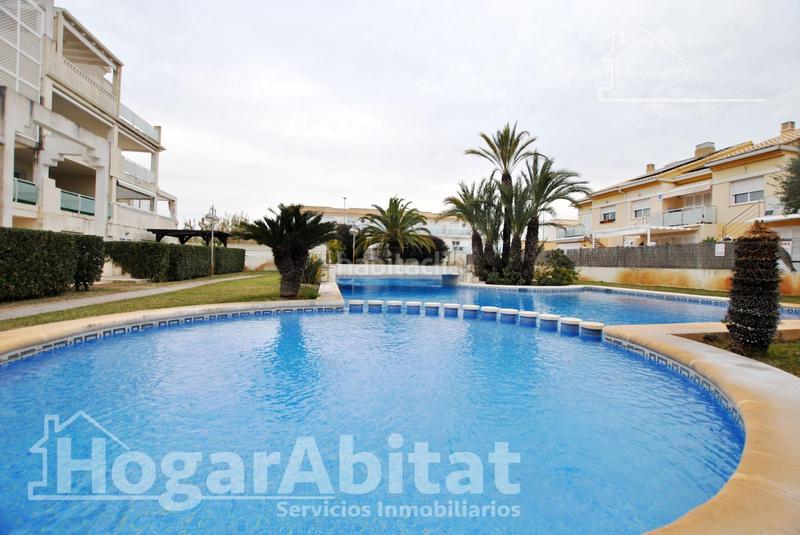 Foto 0b28a97f-21fc-483c-99bc-0c5bc0d004a5. Piso acogedor y todo exterior en residencial con piscina y terraza cerca del mar en Oliva