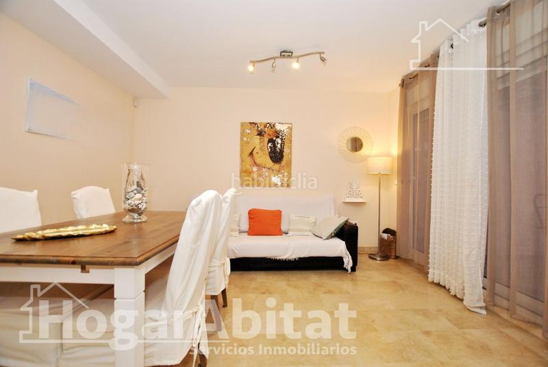 Foto 221c0047-0244-4050-8628-ce386c8a9fe9. Piso acogedor y todo exterior en residencial con piscina y terraza cerca del mar en Oliva