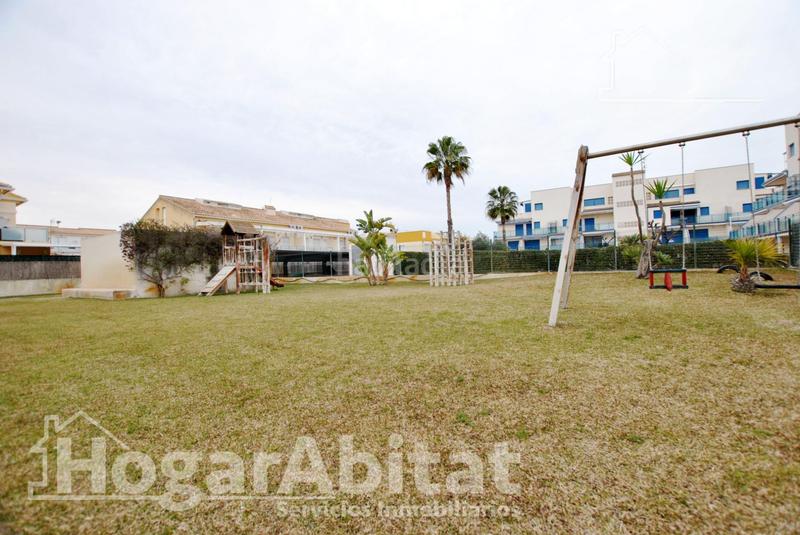 Foto 4f88cea5-927b-444c-a821-961557e15c74. Piso acogedor y todo exterior en residencial con piscina y terraza cerca del mar en Oliva
