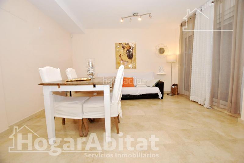 Foto 5f3c7af1-83fd-45fa-9709-356654f62cc6. Piso acogedor y todo exterior en residencial con piscina y terraza cerca del mar en Oliva