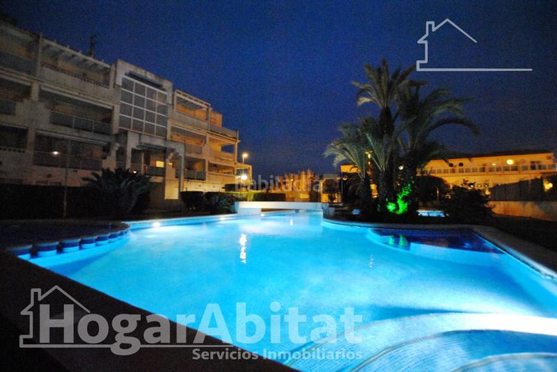 Foto 617d811f-1629-4406-9e39-8e6228108bac. Piso acogedor y todo exterior en residencial con piscina y terraza cerca del mar en Oliva