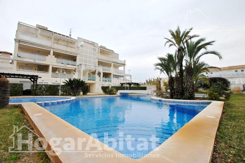 Foto df799ce9-e047-47ee-b5c4-261ad3b5397b. Piso acogedor y todo exterior en residencial con piscina y terraza cerca del mar en Oliva