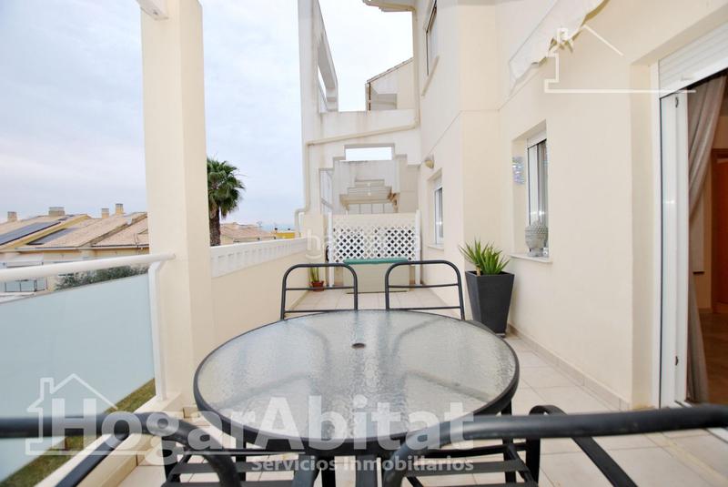 Foto fabf69d2-6013-439f-a7da-c857315d0a3d. Piso acogedor y todo exterior en residencial con piscina y terraza cerca del mar en Oliva