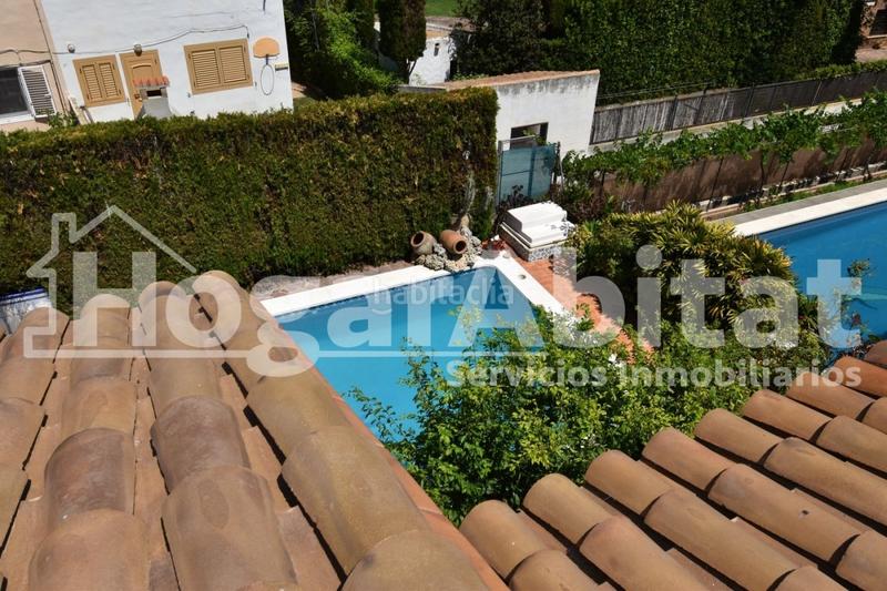 Foto a6969189-3533-4661-9f87-5c7cba2a9959. Chalet villa de 2 alturas con jardín y piscina en Burriana