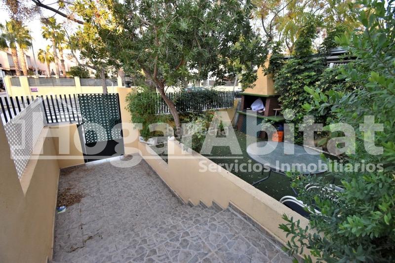 Foto 7b5e4fea-ca86-4a7e-928e-ee4d2dc6478e. Reihenhaus mit parking pool in Playa Burriana