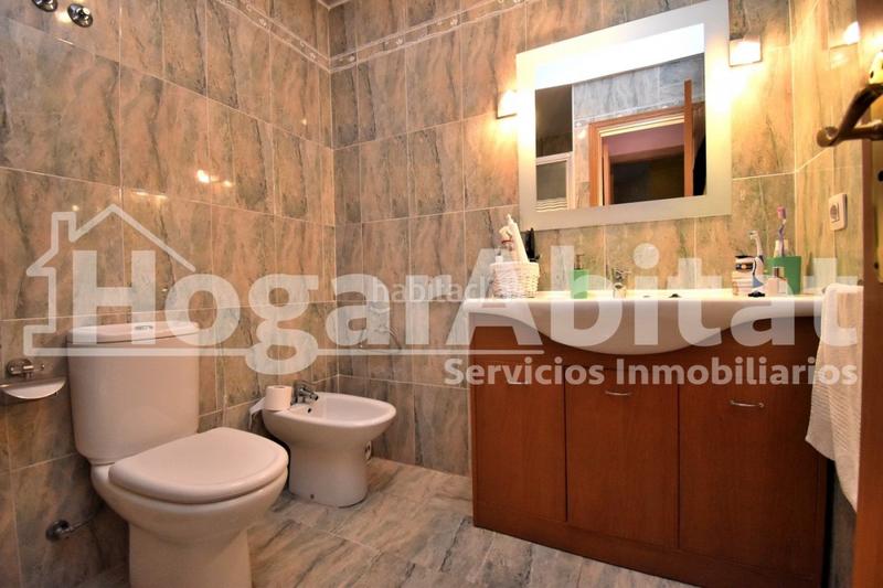 Foto 9df38ef6-f61a-489c-8f4b-9a9083f8b59f. Reihenhaus mit parking pool in Playa Burriana