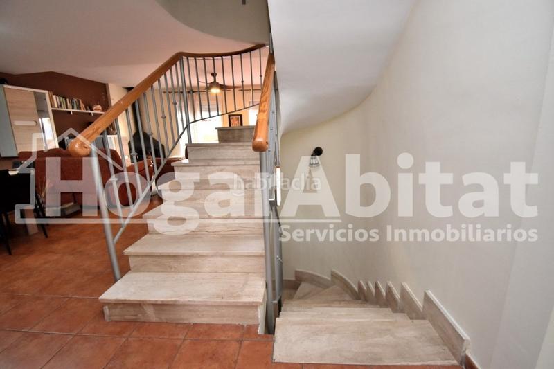 Foto e303fac4-e41d-457c-9102-631ac95bedc8. Reihenhaus mit parking pool in Playa Burriana