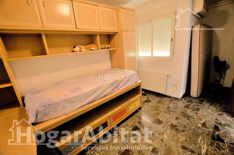 Foto a3b3b439-da5b-40af-bc8d-bd1a68e67a2a. Casa adosada adosado amplio y luminoso con dos terrazas, dos garajes y trastero en Puçol