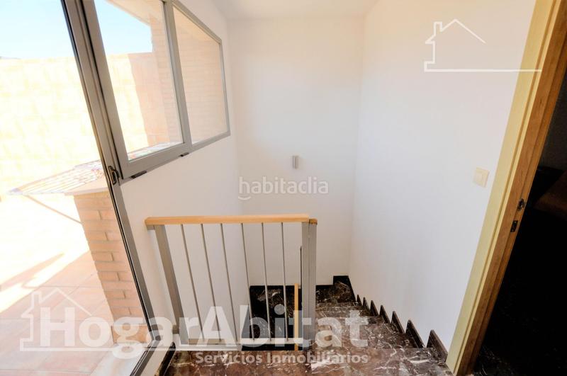 Foto e4c45b66-7054-4a7c-a4c8-515ff331fbb0. Casa adosada adosado amplio y luminoso con dos terrazas, dos garajes y trastero en Puçol