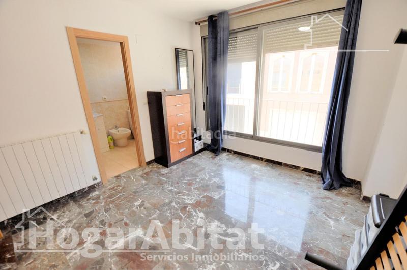 Foto f1c89df7-ddfc-434d-be5e-2f576bda573b. Casa adosada adosado amplio y luminoso con dos terrazas, dos garajes y trastero en Puçol