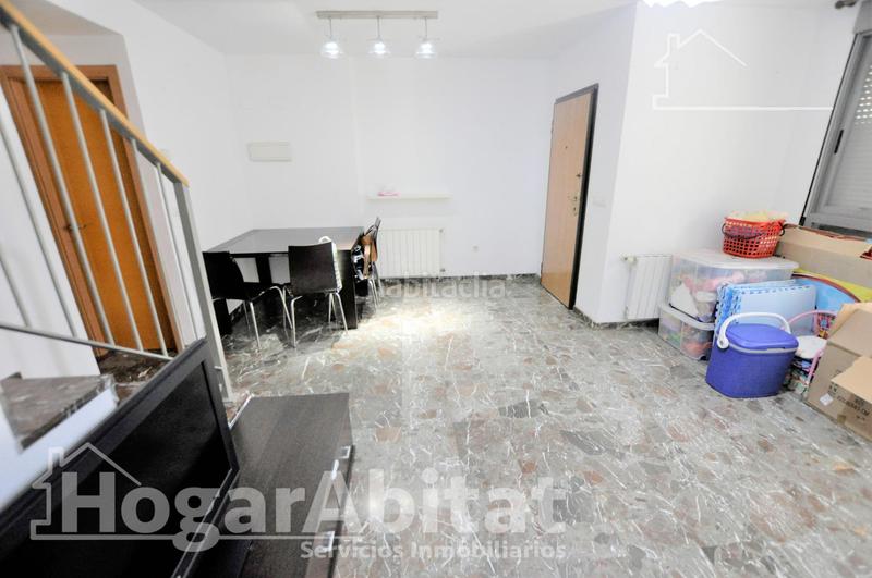 Foto f69c7a61-c815-4367-a895-d9e10cbf9ea1. Casa adosada adosado amplio y luminoso con dos terrazas, dos garajes y trastero en Puçol
