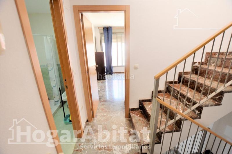 Foto f6f9c240-7763-4601-810d-f24de71cfc20. Casa adosada adosado amplio y luminoso con dos terrazas, dos garajes y trastero en Puçol