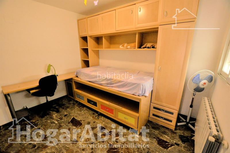 Foto f7e5cbe7-888e-40ae-bb48-63423e9a6c10. Casa adosada adosado amplio y luminoso con dos terrazas, dos garajes y trastero en Puçol