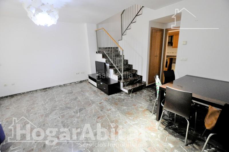 Foto f9838bbc-954b-435b-a5b6-c3f2dd25e559. Casa adosada adosado amplio y luminoso con dos terrazas, dos garajes y trastero en Puçol
