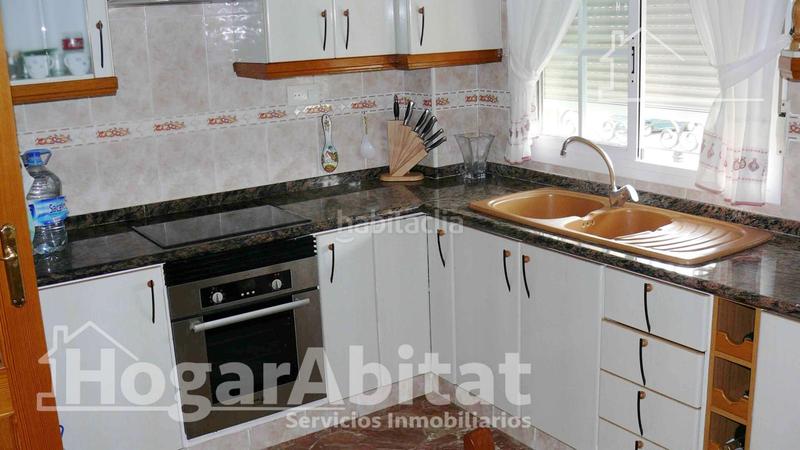 Foto 078d1b18-0e1e-4bb1-9bfd-ad37404fc669. Chalet  con piscina, 3 terrazas y parking en Moncofa