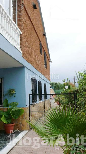 Foto faf525bd-b48d-4c4f-8f64-3bb75db39e90. Chalet  con piscina, 3 terrazas y parking en Moncofa