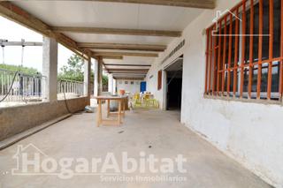 Xalet a Bulevar del Xúquer. Chalet en suelo rústico con terraza, paellero y parking