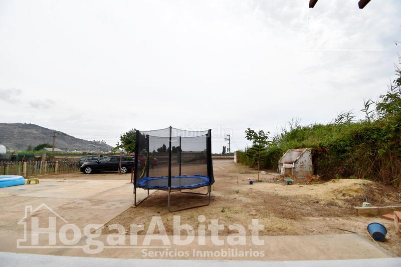 Foto 42c9b47a-0199-44b5-a15f-8014bafd6e17. Xalet amb aparcament a Bulevar del Xúquer Cullera