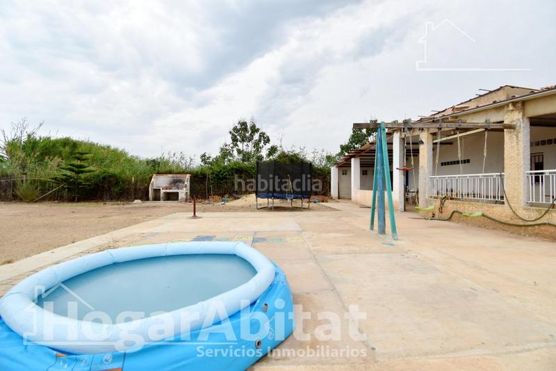 Foto a91d617e-5489-4942-a0bf-69ae06fc8907. Xalet amb aparcament a Bulevar del Xúquer Cullera