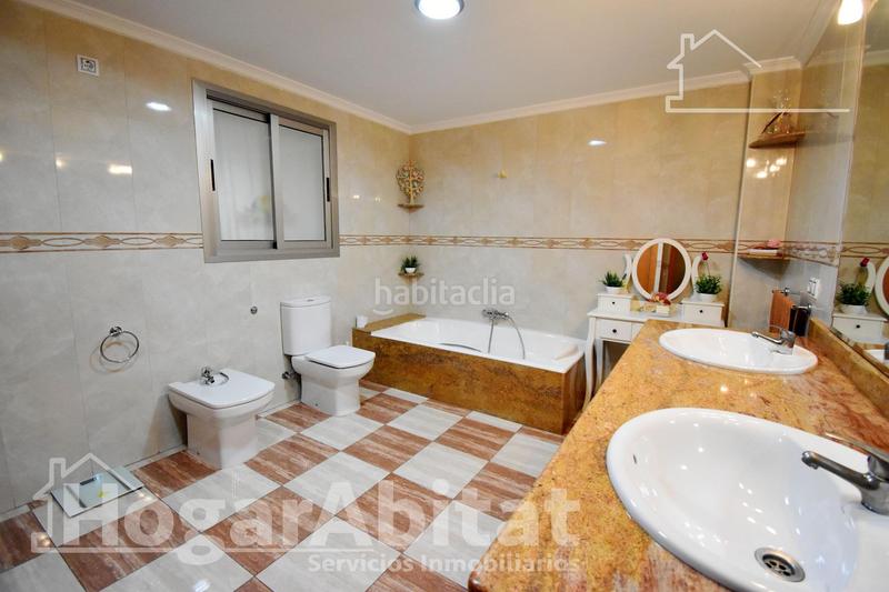 Foto f3d13f69-0372-4a5c-9003-be10ef471ffc. Casa  seminueva con gran terraza y garaje en Xeraco