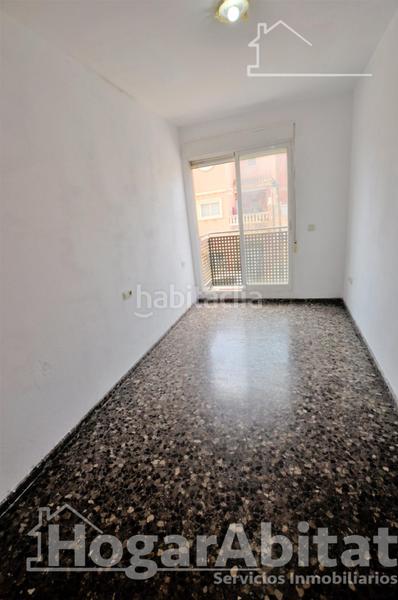 Foto 16a66629-40f7-49ae-a64d-cb1fc3b8a018. Piso muy amplio y luminoso con dos balcones y ascensor en Puçol