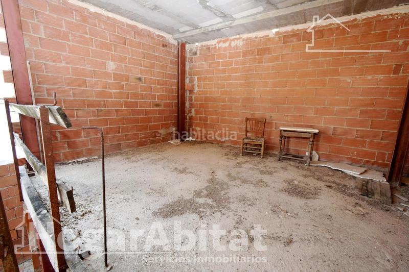 Foto c54e0cde-d095-4fcf-81eb-7b470dc9081b. Casa amb aparcament a Cheste
