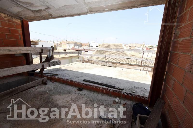 Foto fd72b62d-ee96-4607-a6de-6ca56a80f9de. Casa amb aparcament a Cheste