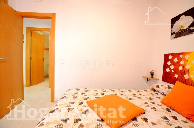 Foto 21e595a8-d56a-4c4e-ba0a-be443da674b3. Piso playa de daimuz! bajo esquinero y luminoso con parking y gran terraza en Daimús