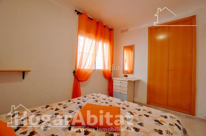 Foto 425e6dae-f761-4a88-9a00-393f77b3cc87. Piso playa de daimuz! bajo esquinero y luminoso con parking y gran terraza en Daimús