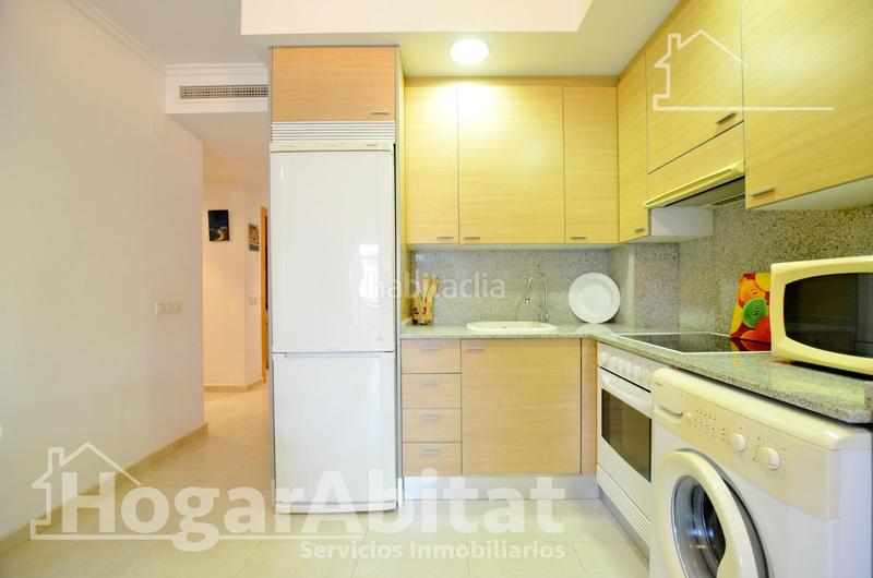 Foto 5076aab7-b9ed-4764-abb5-79f8d5c8cbc2. Piso playa de daimuz! bajo esquinero y luminoso con parking y gran terraza en Daimús