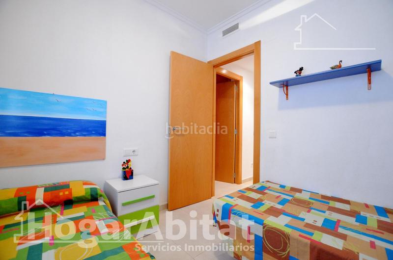 Foto b646b313-2b51-4093-876c-4c68abc022b9. Piso playa de daimuz! bajo esquinero y luminoso con parking y gran terraza en Daimús