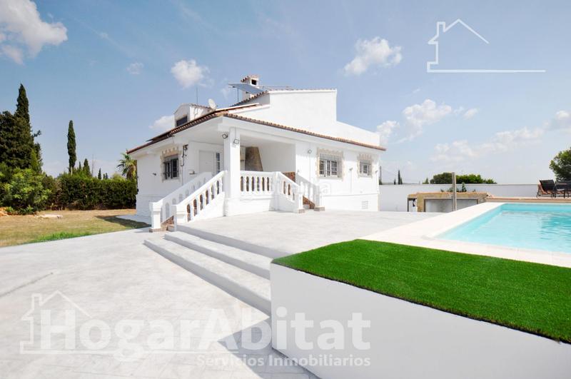 Foto 0d79af4b-8e12-4cff-9ea6-646e343680c3. Chalet  espectacular! reformado y amplio con piscina privada, garaje y parcela en Cheste