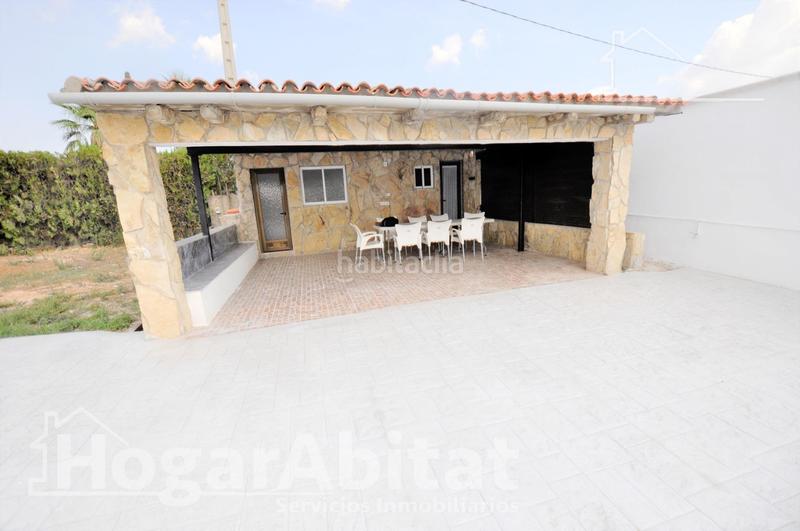 Foto 58dc04a5-d1d3-4a85-8be4-2717db9aa939. Chalet  espectacular! reformado y amplio con piscina privada, garaje y parcela en Cheste