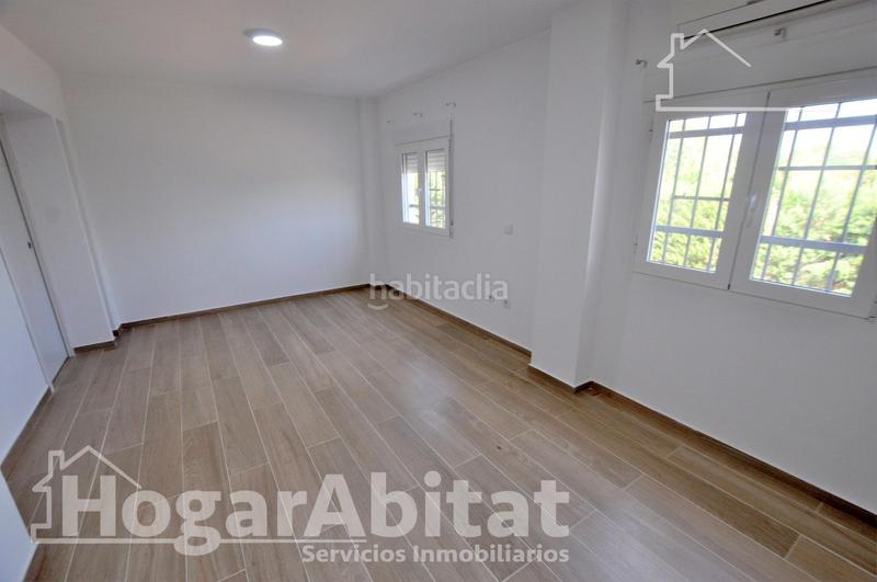Foto 7dbe7e42-6d9a-4c36-95eb-ab33c37c3301. Chalet  espectacular! reformado y amplio con piscina privada, garaje y parcela en Cheste