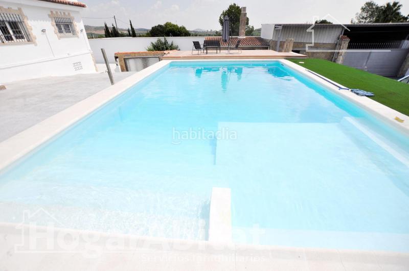 Foto 96d6be34-dffe-4108-a67b-4a6ea99dce76. Chalet  espectacular! reformado y amplio con piscina privada, garaje y parcela en Cheste