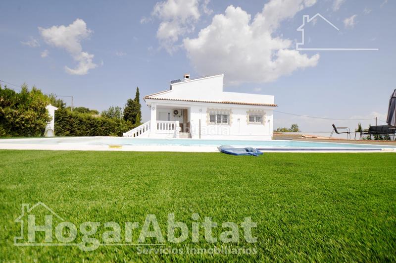 Foto c7f57026-8950-47c6-97c1-d4c26381069c. Chalet  espectacular! reformado y amplio con piscina privada, garaje y parcela en Cheste