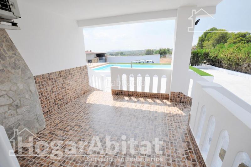 Foto e6b1f8ee-f0f9-4725-a564-3cf23321fe00. Chalet  espectacular! reformado y amplio con piscina privada, garaje y parcela en Cheste