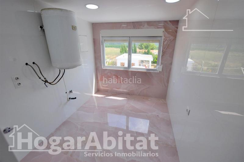 Foto fe139ab0-dc18-4c1a-9887-e4c5af819951. Chalet  espectacular! reformado y amplio con piscina privada, garaje y parcela en Cheste
