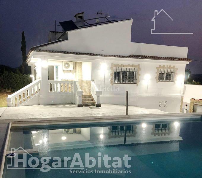 Foto ce11a840-1d5a-4bdc-ac05-8dc035d770a3. Chalet  espectacular! reformado y amplio con piscina privada, garaje y parcela en Cheste