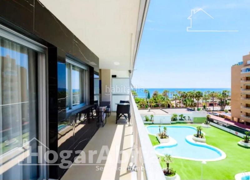 Foto 0c44bed5-ee34-45d9-81b4-43aea83127d5. Piso vistas laterales al mar! seminuevo en residencial en 1 línea con piscina, terraza y garaje en Oropesa del Mar