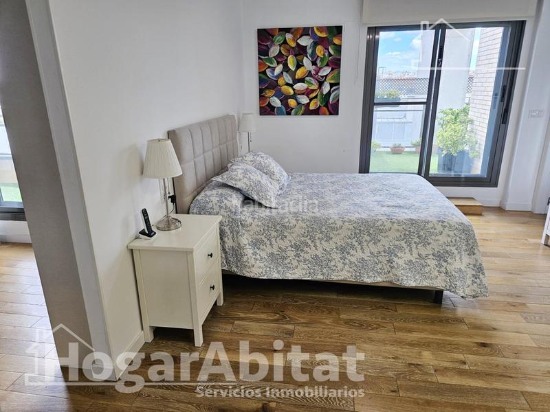 Foto f2caea7e-5971-4253-a974-4ec3a054d04e. Ático magnifico ático seminuevo con dos garajes, dos trasteros y piscina en Paterna