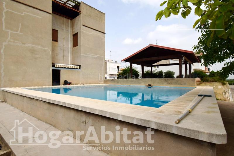 Foto 2a6de020-0771-40c8-8d18-0f3dbf0d7236. Casa benicull centro! magnífico chalet con piscina privada y terraza en Benicull De Xúquer
