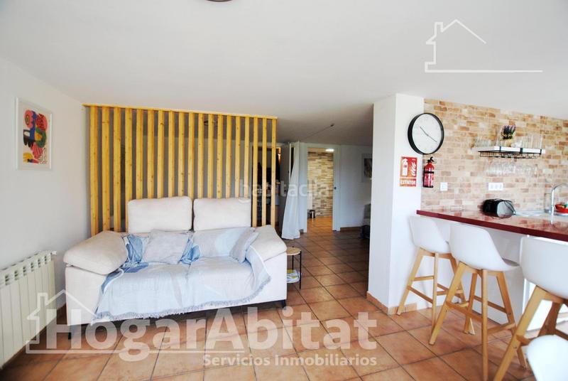 Foto 32c1aac0-ccb7-48fe-8777-ef57719fe05e. Chalet  con piscina, garaje, terraza y barbacoa en Gandia