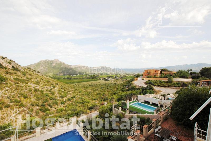 Foto 33fd5f32-5ba2-4411-b340-ee52cadeff36. Chalet  con piscina, garaje, terraza y barbacoa en Gandia